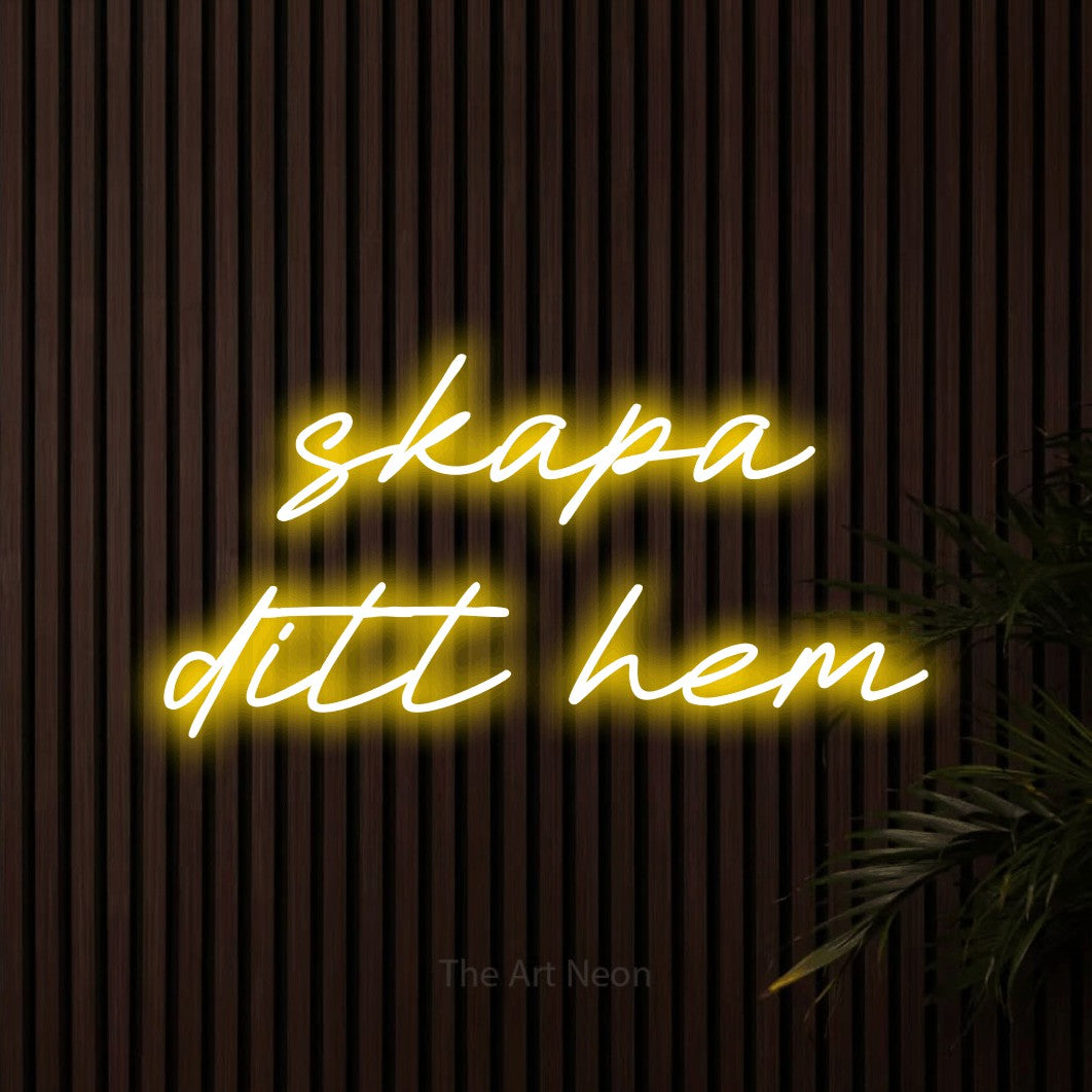 LED neon sign reading “skapa ditt hem”, arranged in 2 lines.