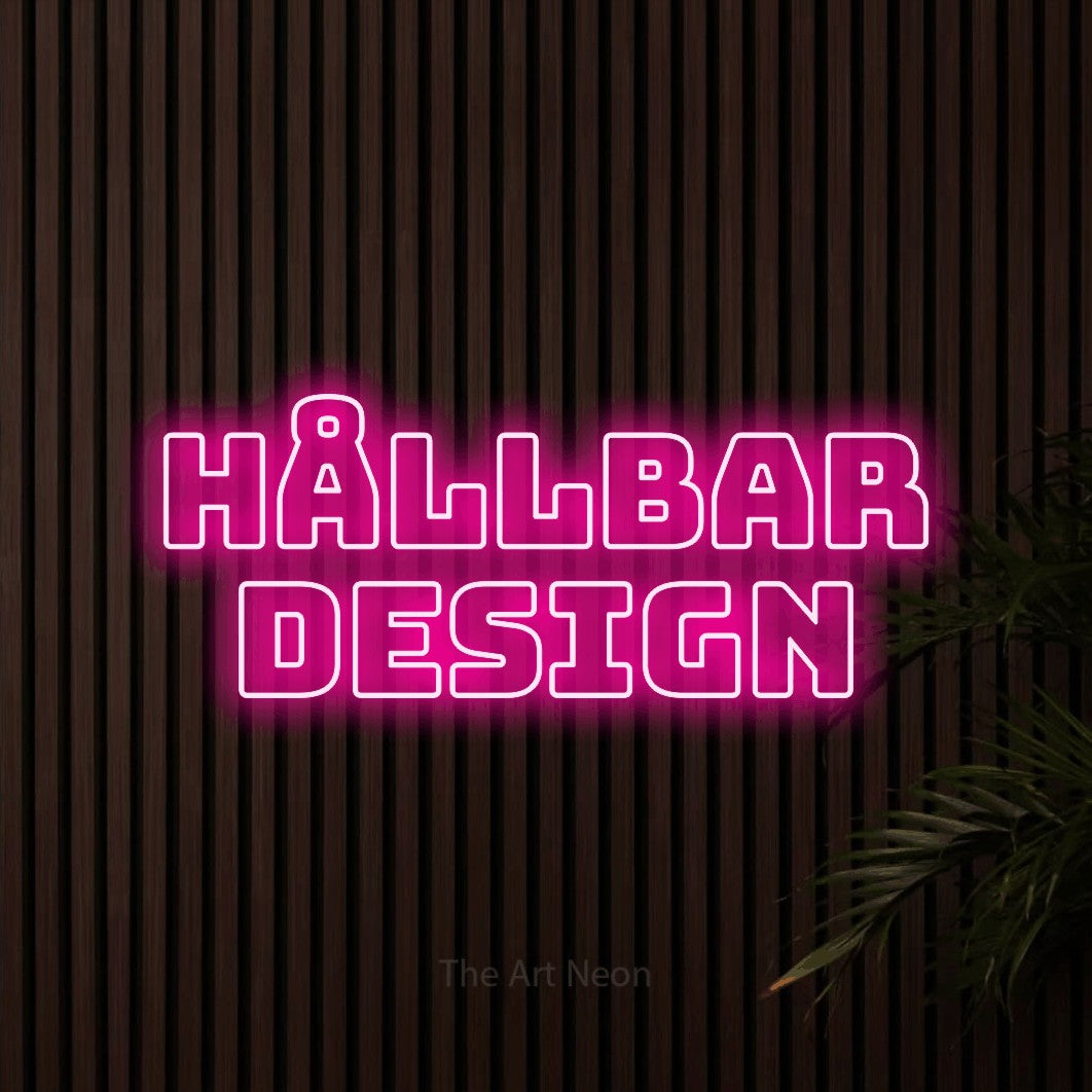 LED neon sign reading “hållbar design”, arranged in 2 lines.