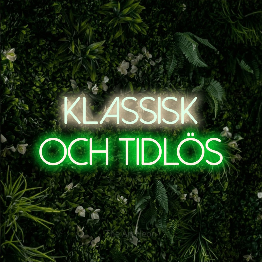 LED neon sign reading “KLASSISK OCH TIDLÖS”, arranged in 2 lines.