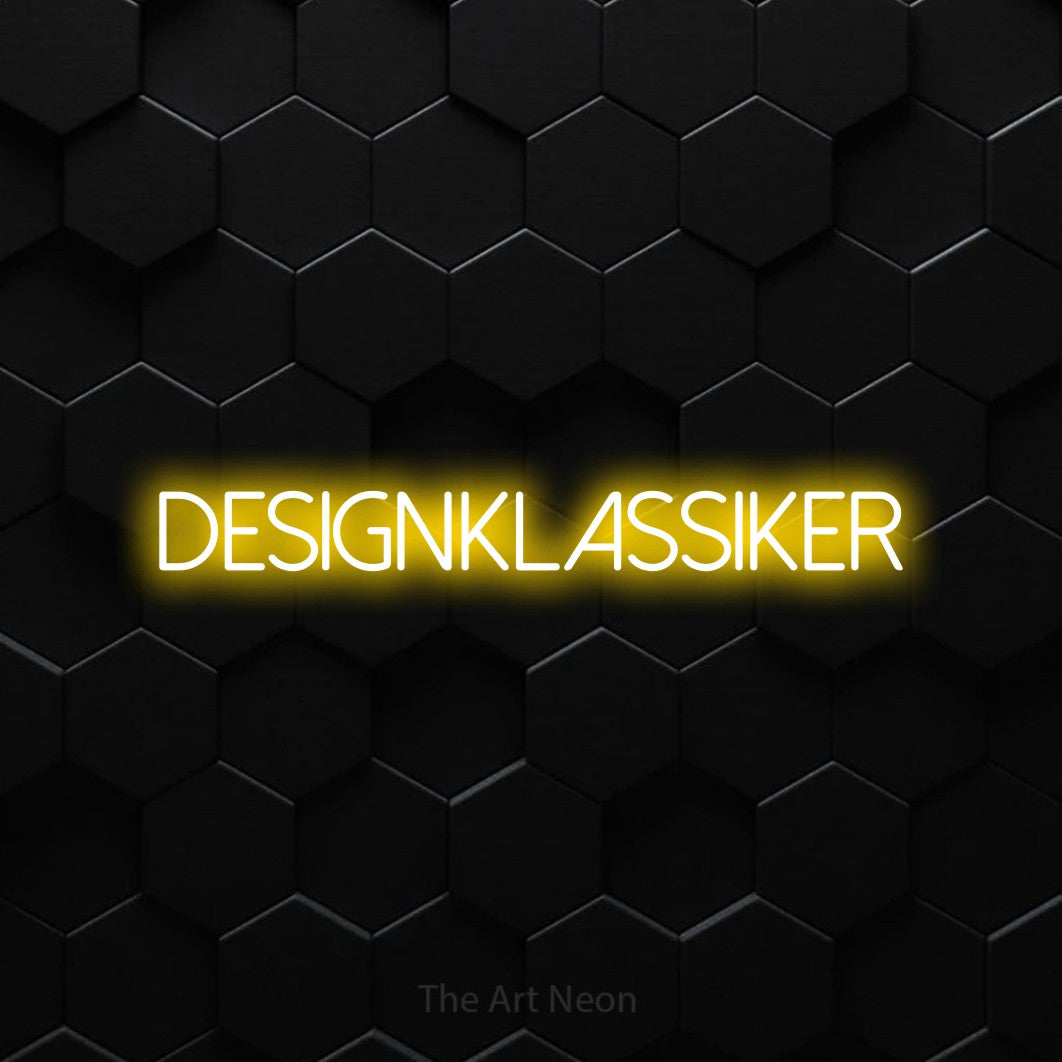 LED neon sign reading “Designklassiker”, arranged in a single line.