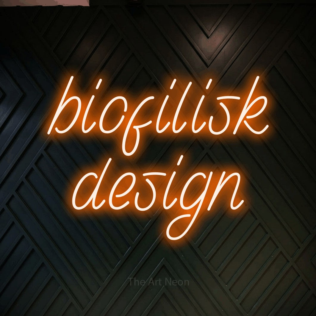 LED neon sign reading “biofilisk design”, arranged in 2 lines.