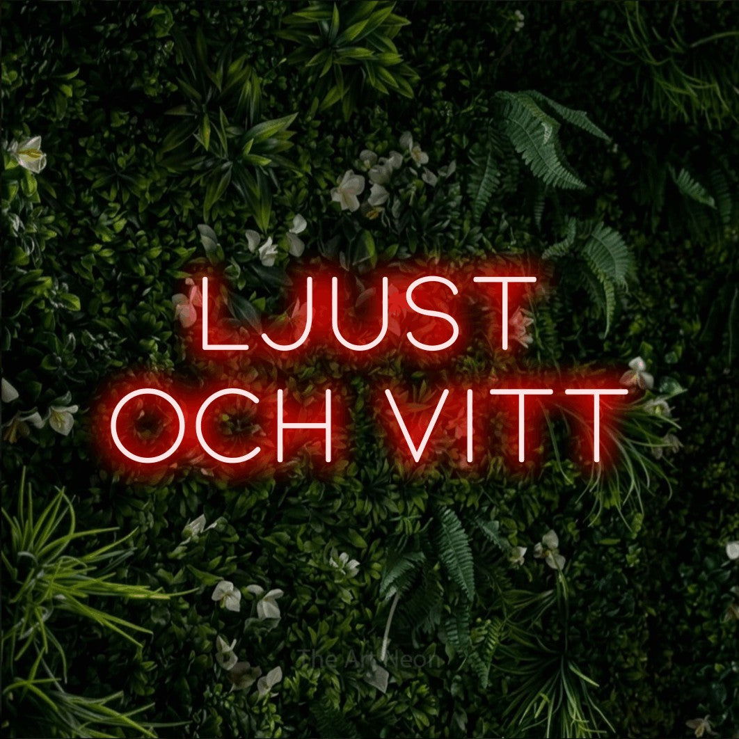 LED neon sign reading “LJUST OCH VITT”, arranged in 2 lines.