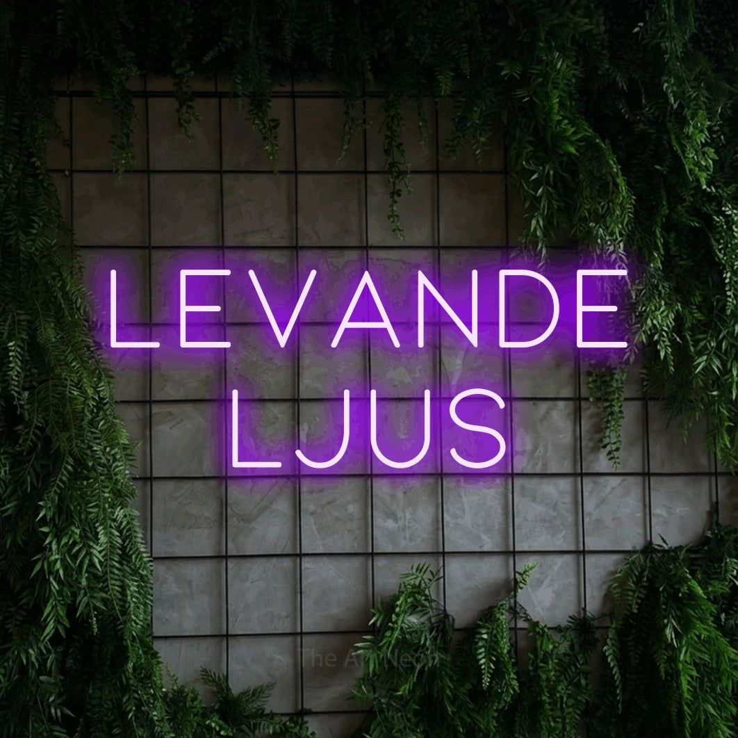 LED neon sign reading “LEVANDE LJUS”, arranged in 2 lines.