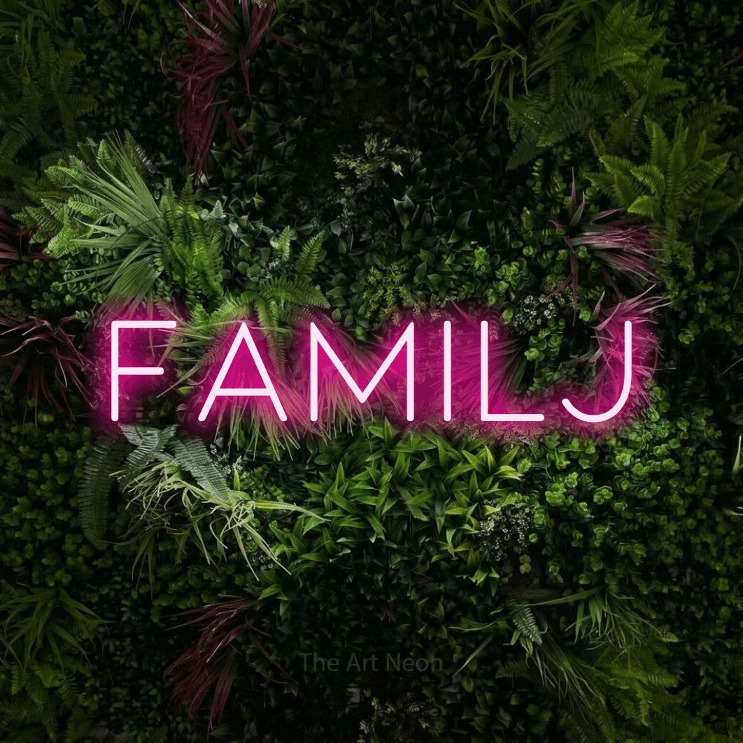 LED neon sign reading “Familj”, arranged in a single line.
