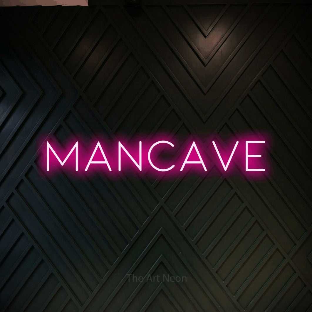 LED neon sign reading “mancave”, arranged in a single line.