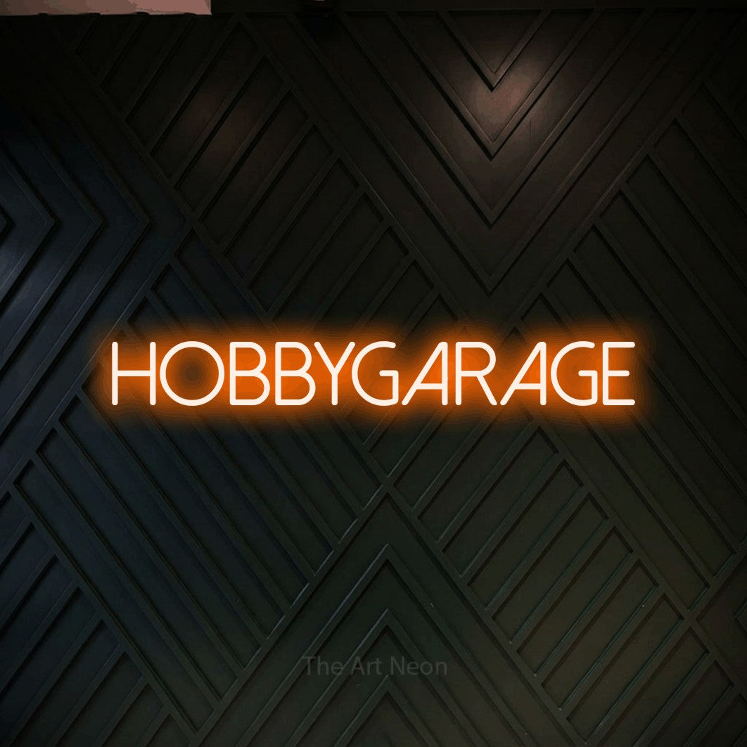 LED neon sign reading “HOBBYGARAGE”, arranged in a single line.