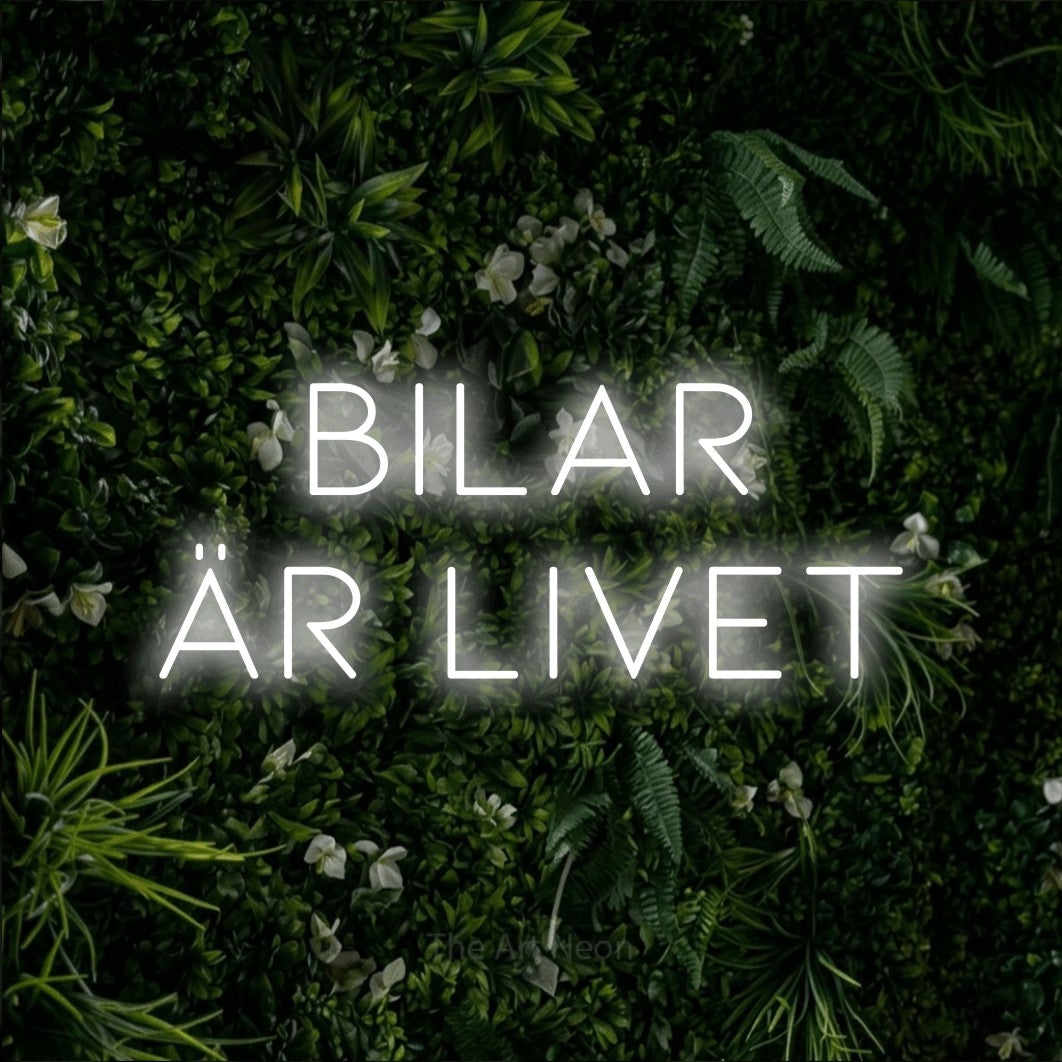LED neon sign reading “BILAR ÄR LIVET”, arranged in 2 lines.