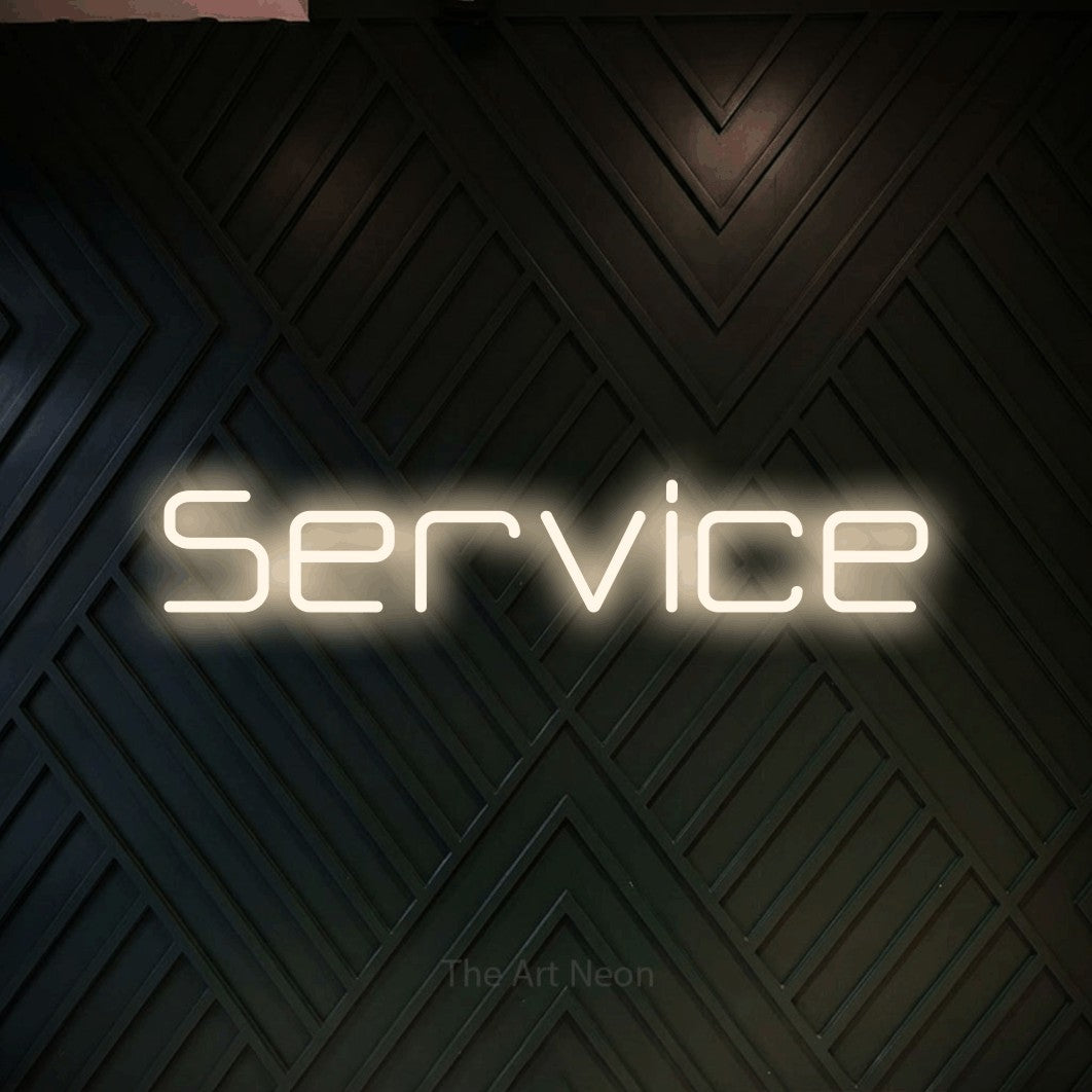 LED neon sign reading “Service”, arranged in a single line.