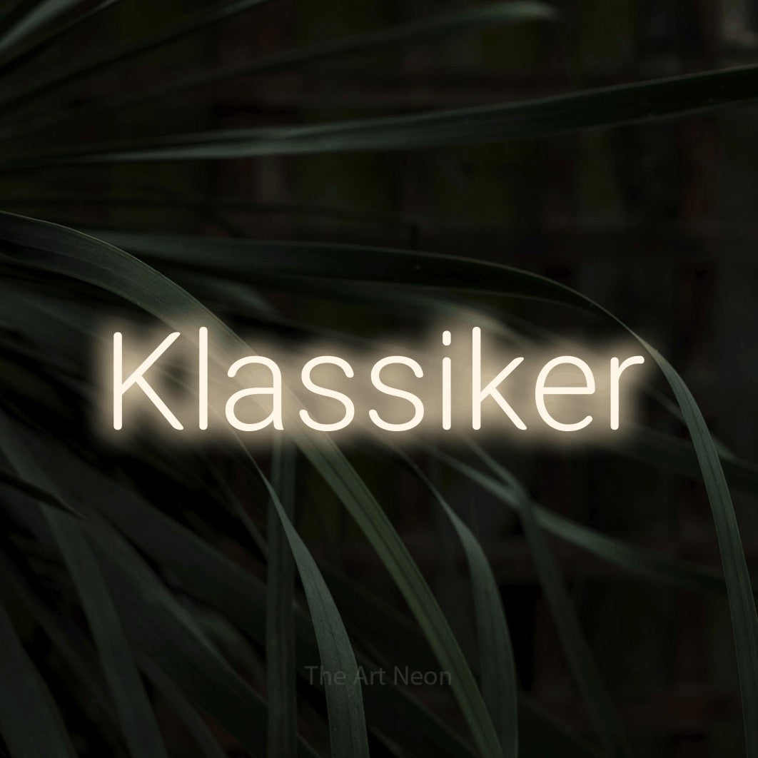 LED neon sign reading “Klassiker”, arranged in a single line.