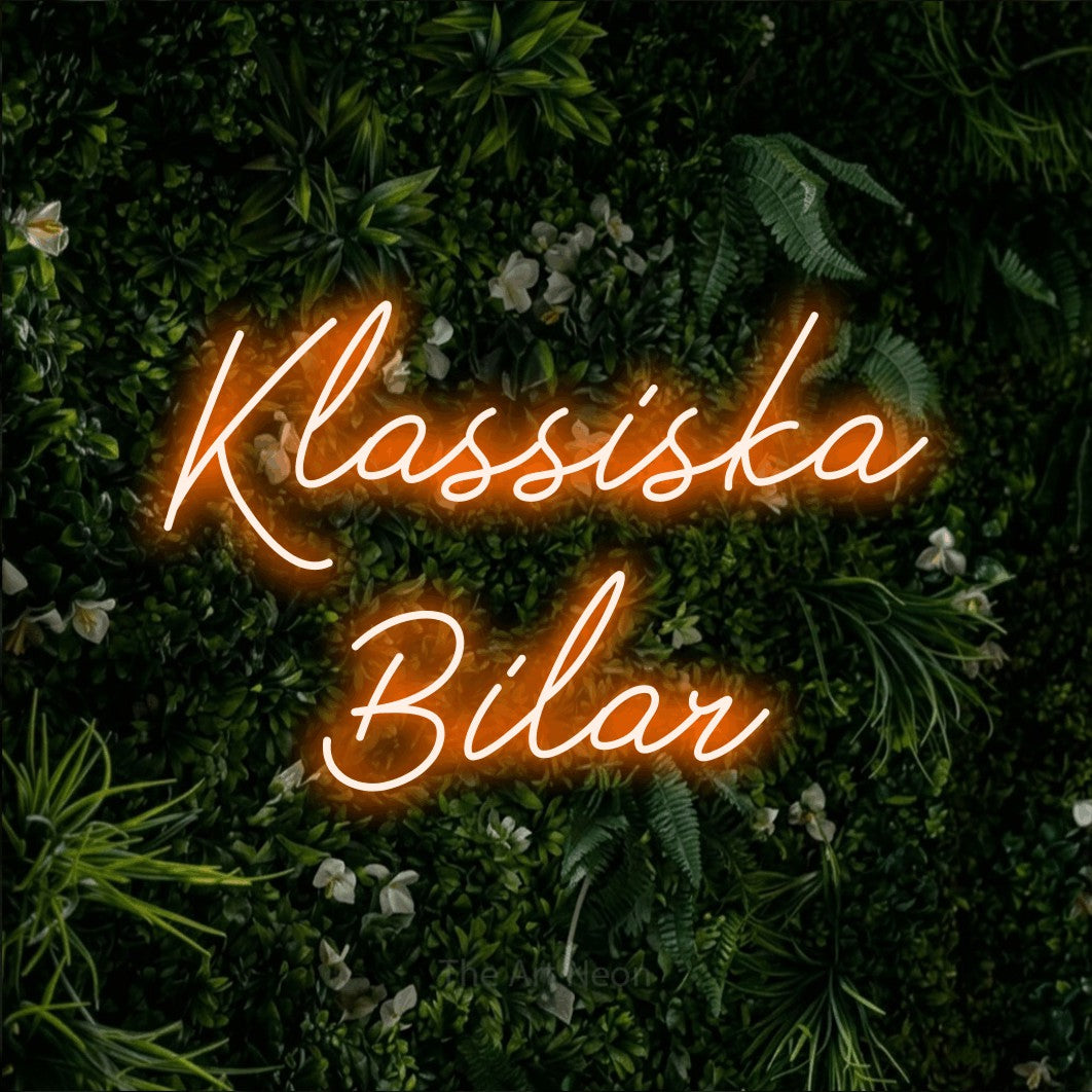 LED neon sign reading “Klassiska Bilar”, arranged in 2 lines.
