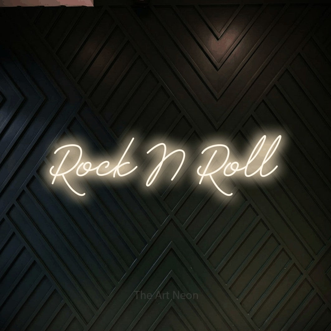 LED neon sign reading “Rock N Roll”, arranged in a single line.