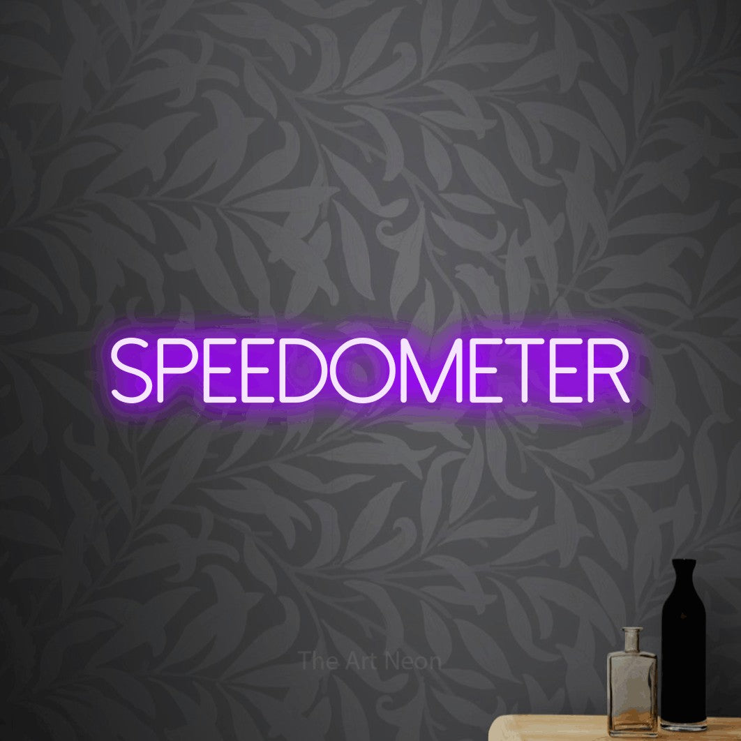 LED neon sign reading “SPEEDOMETER”, arranged in a single line.