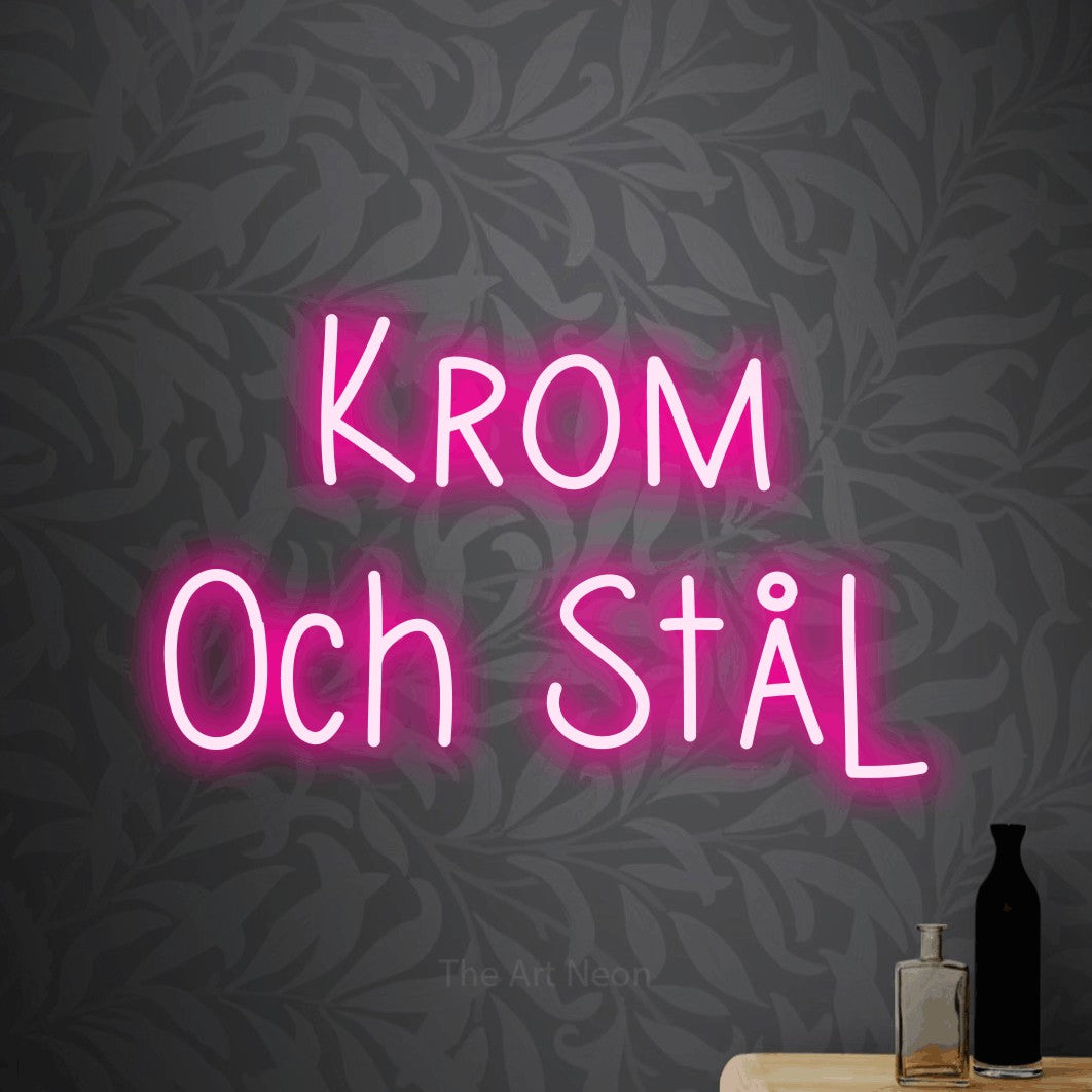 LED neon sign reading “Krom Och Stål”, arranged in 2 lines.