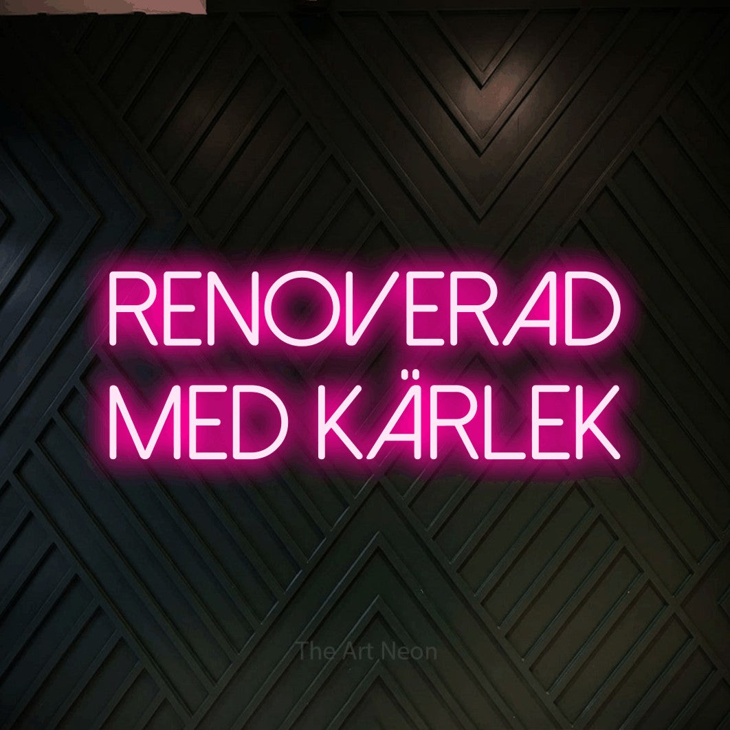 LED neon sign reading “renoverad med kärlek”, arranged in 2 lines.