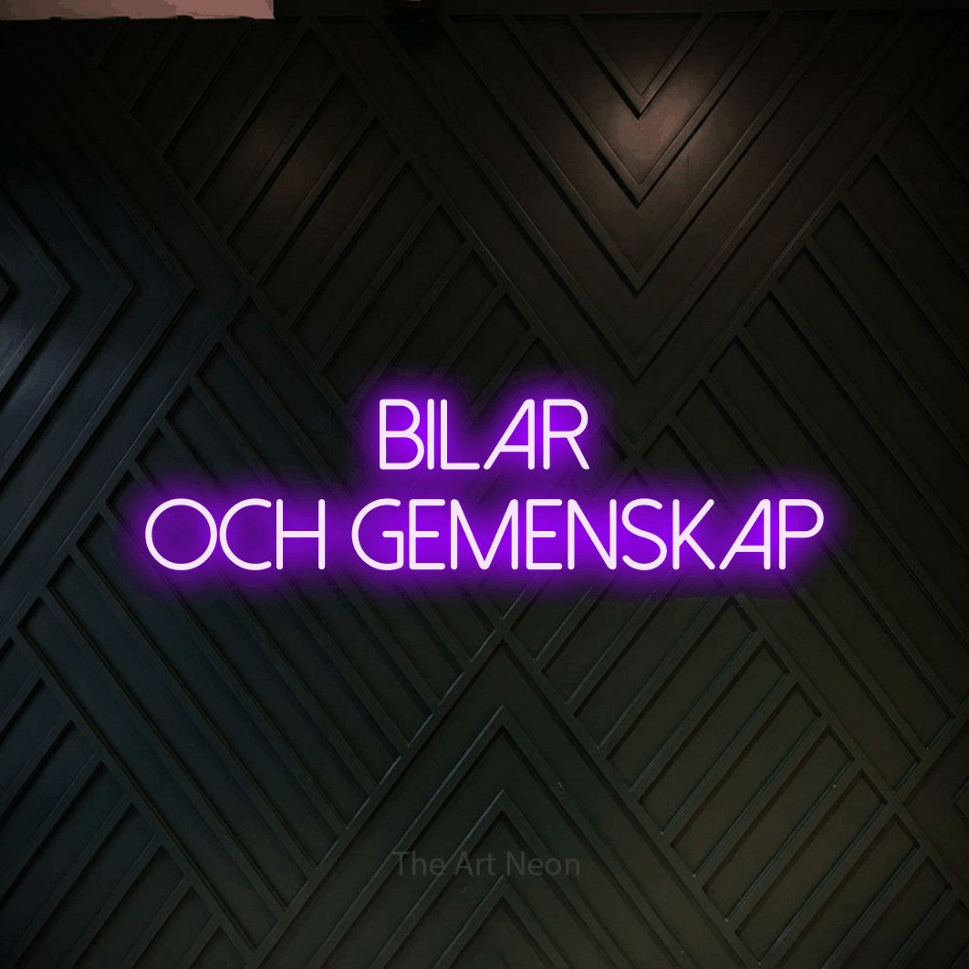 LED neon sign reading “Bilar Och Gemenskap”, arranged in 2 lines.