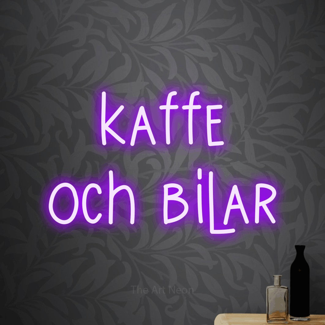LED neon sign reading “kaffe och bilar”, arranged in 2 lines.
