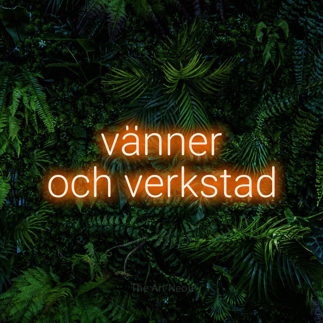 LED neon sign reading “vänner och verkstad”, arranged in 2 lines.