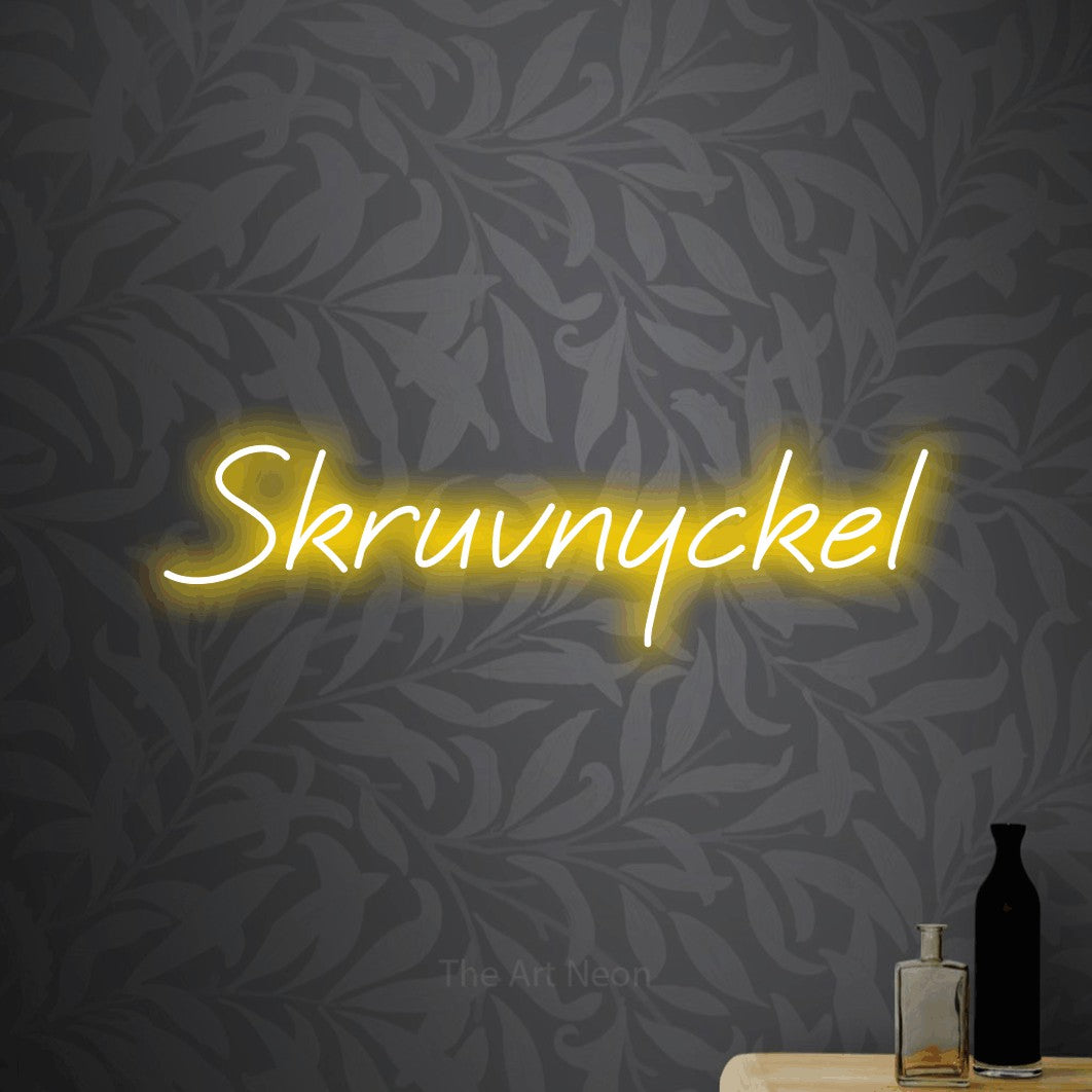 LED neon sign reading “Skruvnyckel”, arranged in a single line.