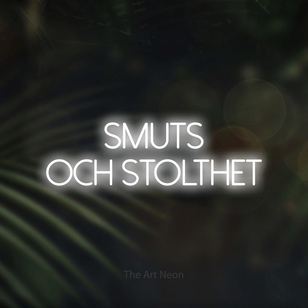 LED neon sign reading “SMUTS OCH STOLTHET”, arranged in 2 lines.
