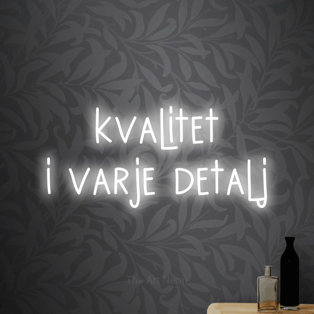 LED neon sign reading “kvalitet i varje detalj”, arranged in 2 lines.