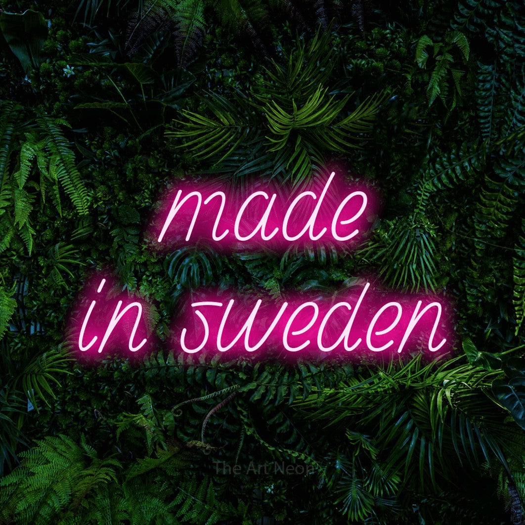 LED neon sign reading “made in sweden”, arranged in 2 lines.