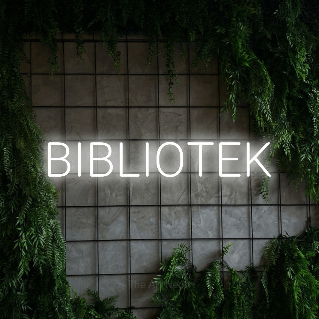 LED neon sign reading “BIBLIOTEK”, arranged in a single line.