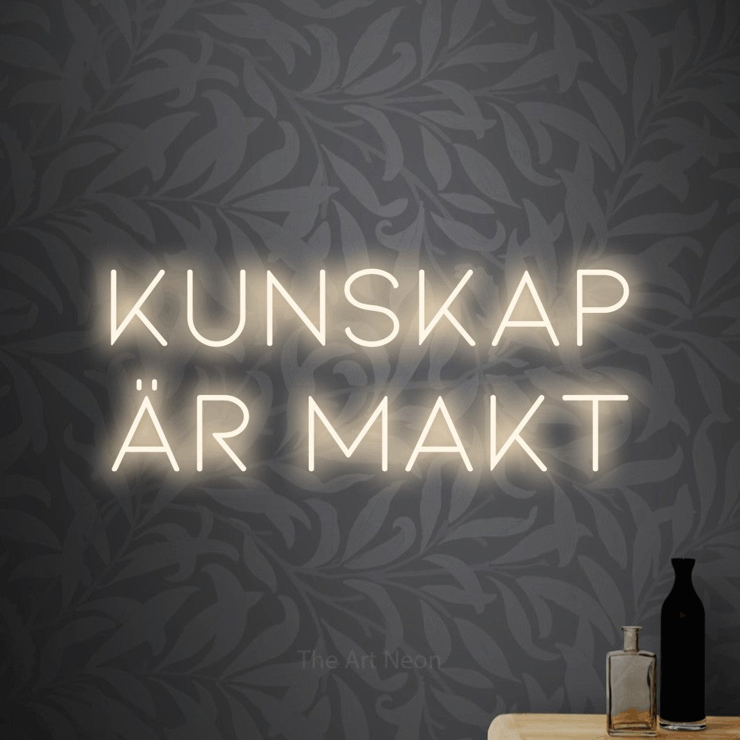 LED neon sign reading “Kunskap Är Makt”, arranged in 2 lines.