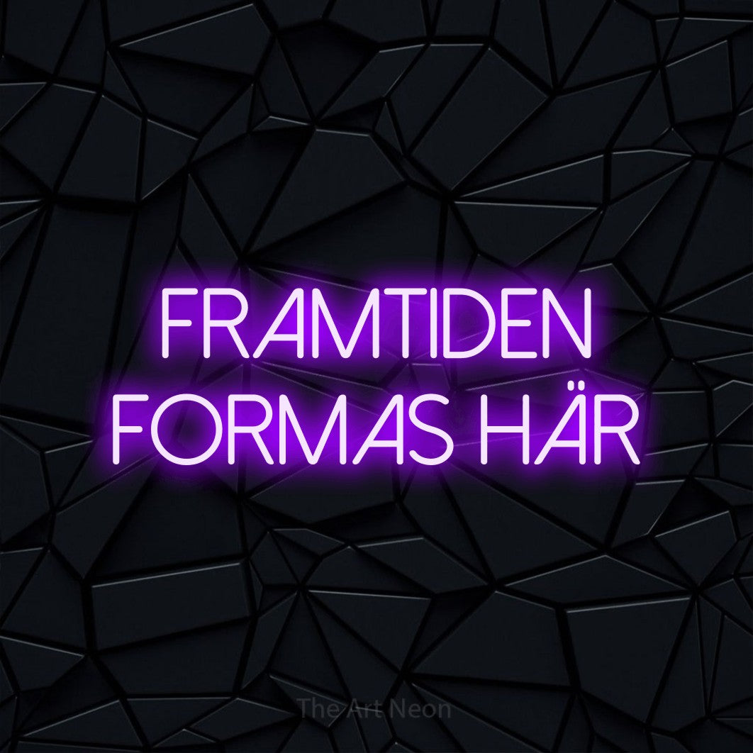 LED neon sign reading “FRAMTIDEN FORMAS HÄR”, arranged in 2 lines.