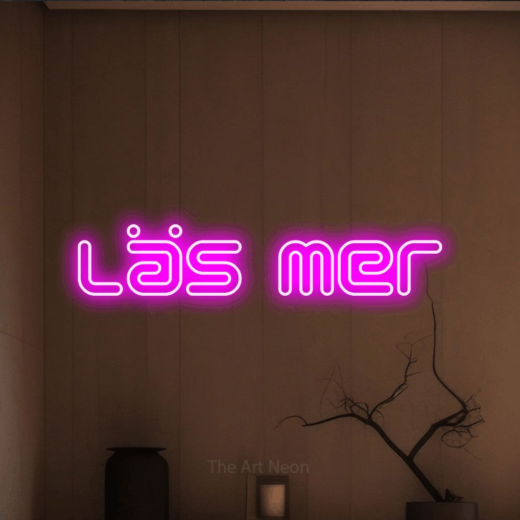 LED neon sign reading “läs mer”, arranged in a single line.