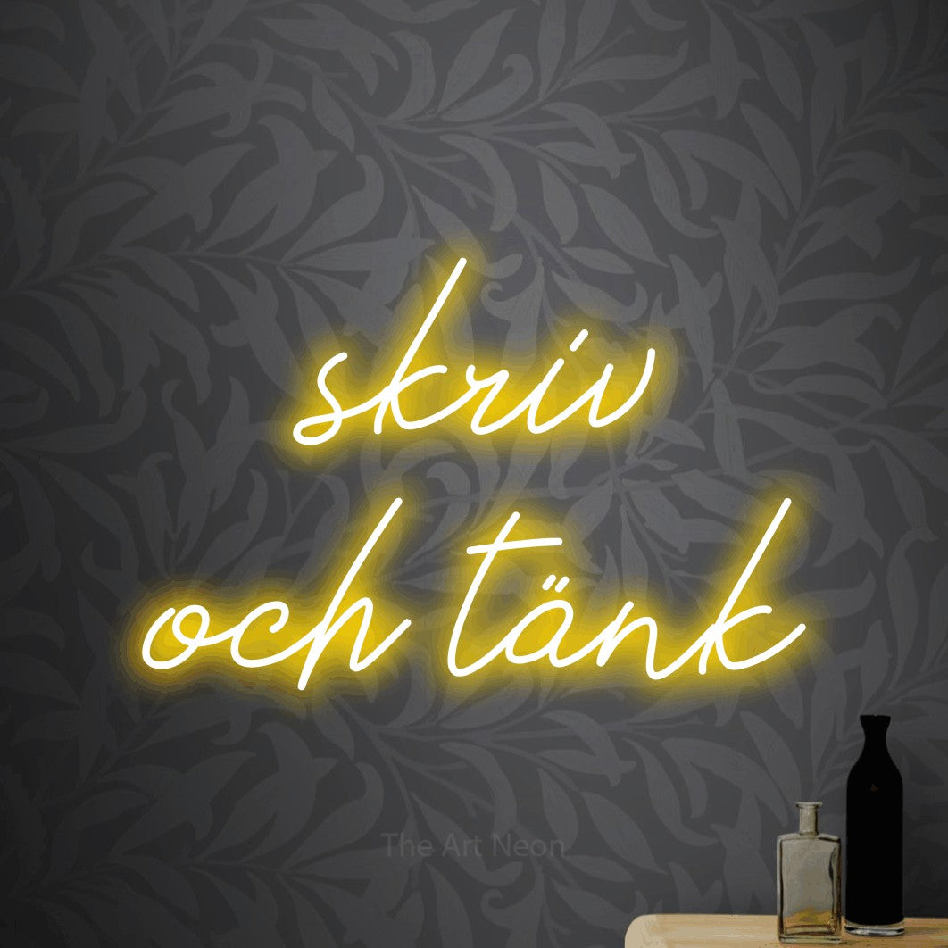 LED neon sign reading “skriv och tänk”, arranged in 2 lines.