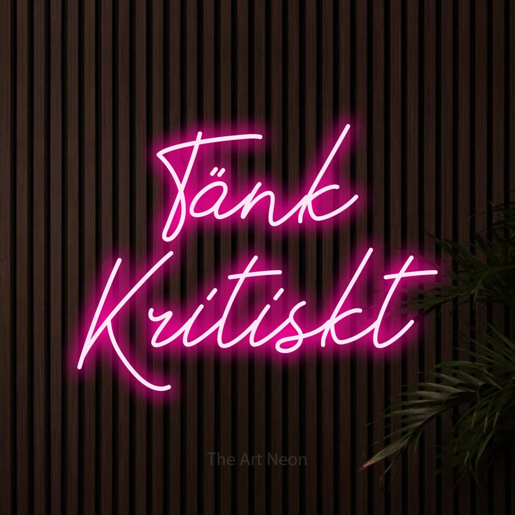 LED neon sign reading “Tänk Kritiskt”, arranged in 2 lines.