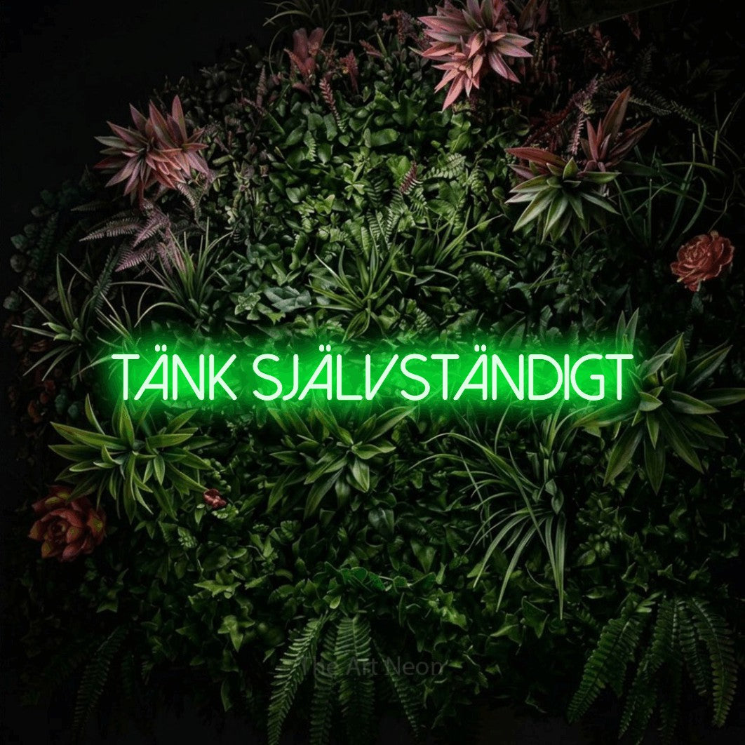 LED neon sign reading “tänk självständigt”, arranged in a single line.