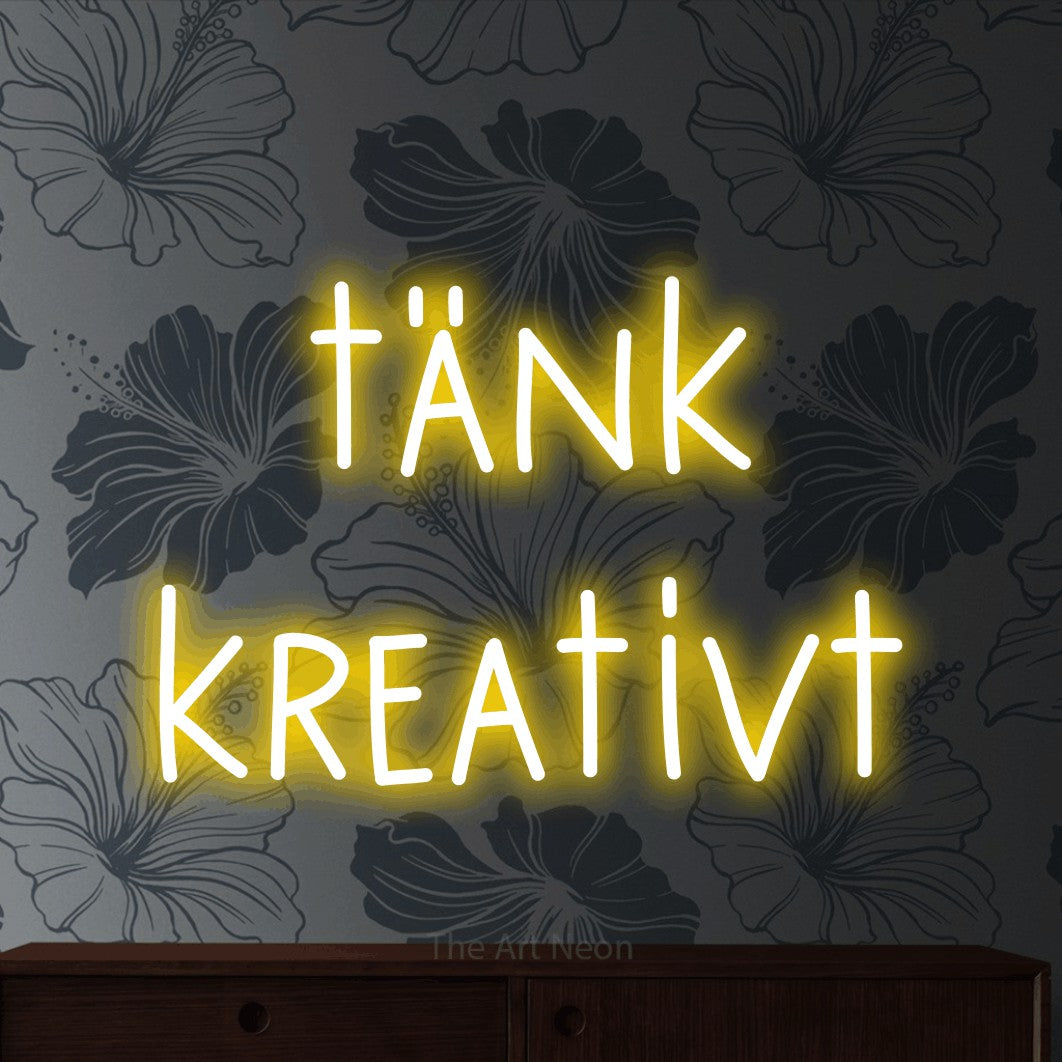 LED neon sign reading “tänk kreativt”, arranged in 2 lines.