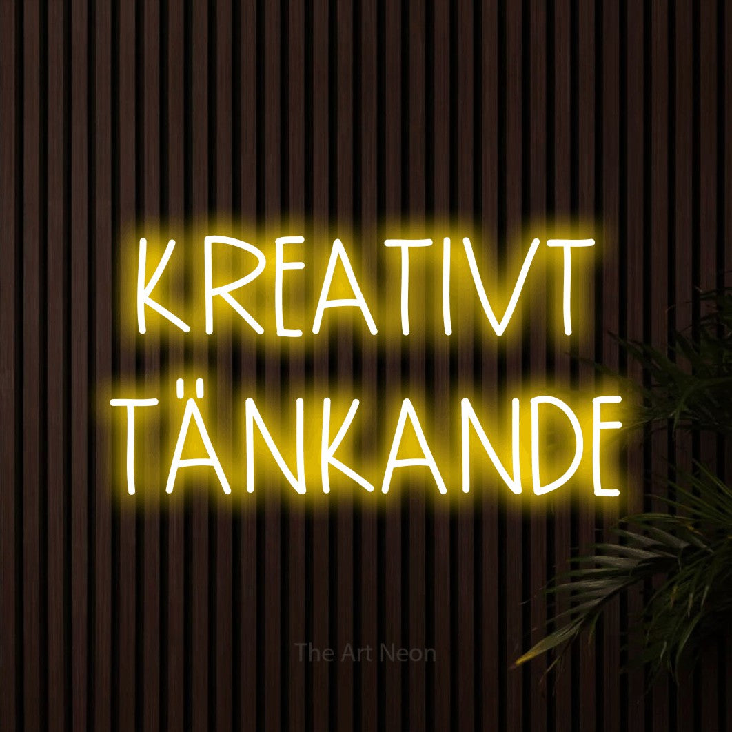 LED neon sign reading “KREATIVT TÄNKANDE”, arranged in 2 lines.