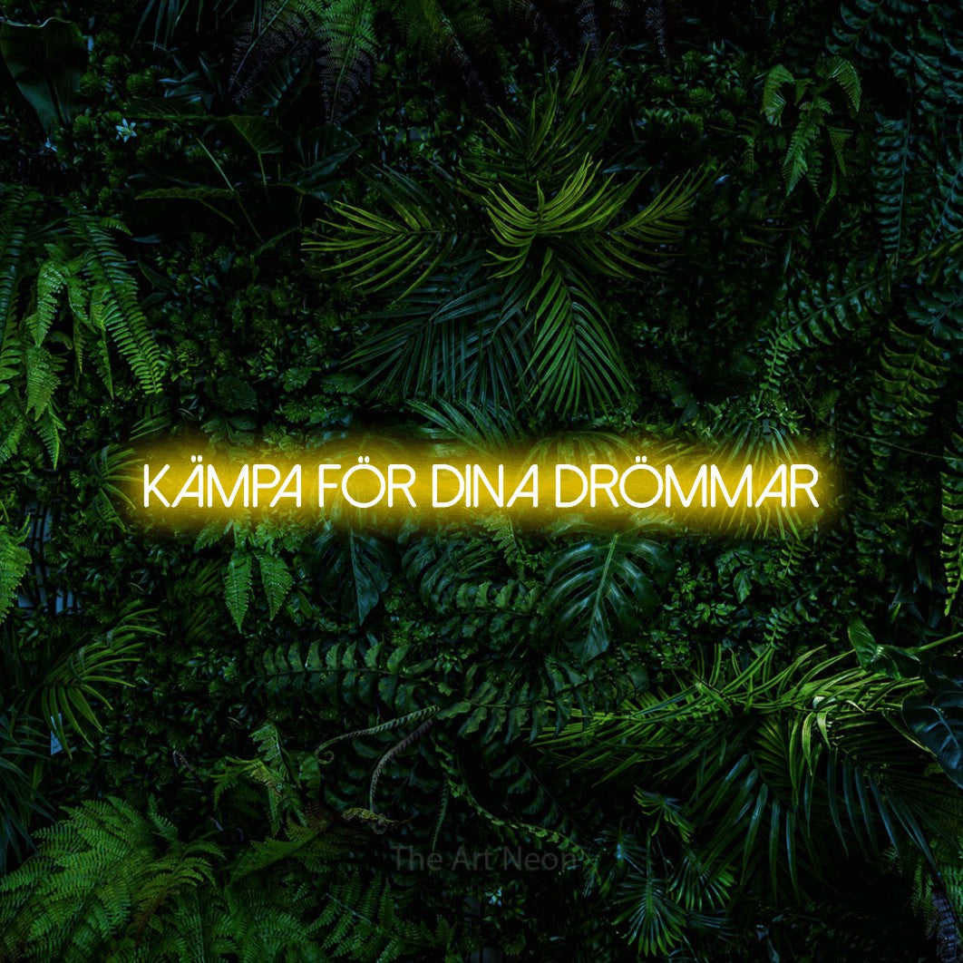 LED neon sign reading “kämpa för dina DRÖMMAR”, arranged in a single line.