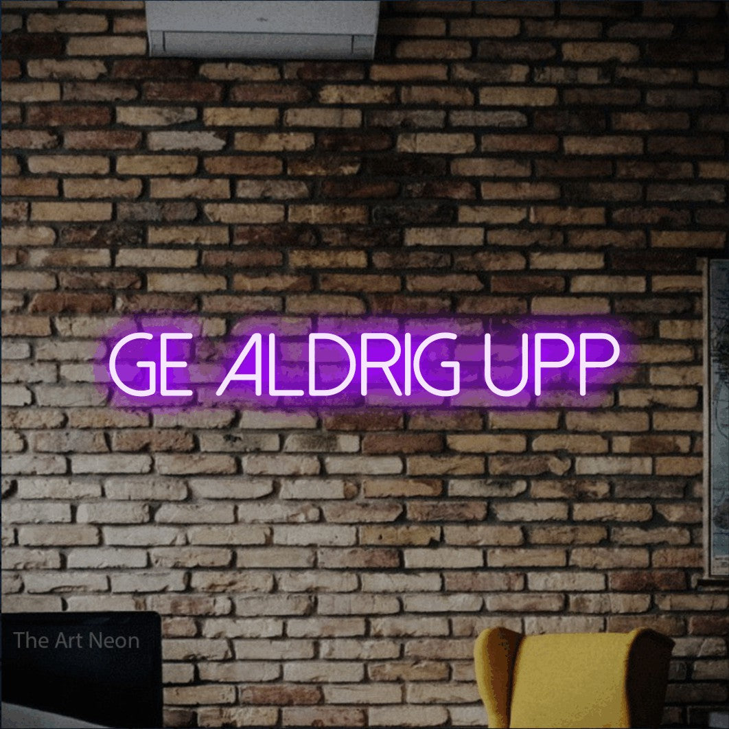 LED neon sign reading “Ge Aldrig Upp”, arranged in a single line.