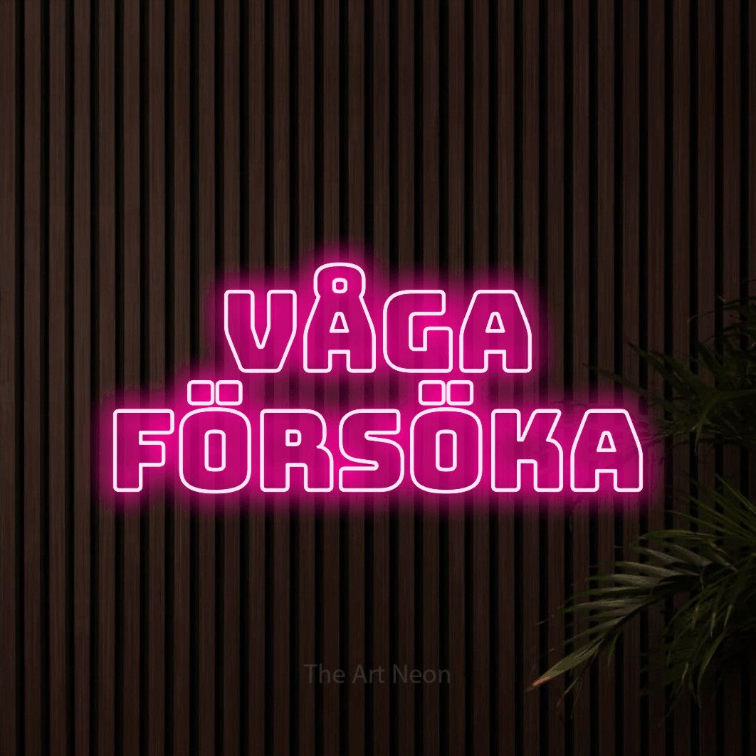 LED neon sign reading “våga FÖRSÖKA”, arranged in 2 lines.