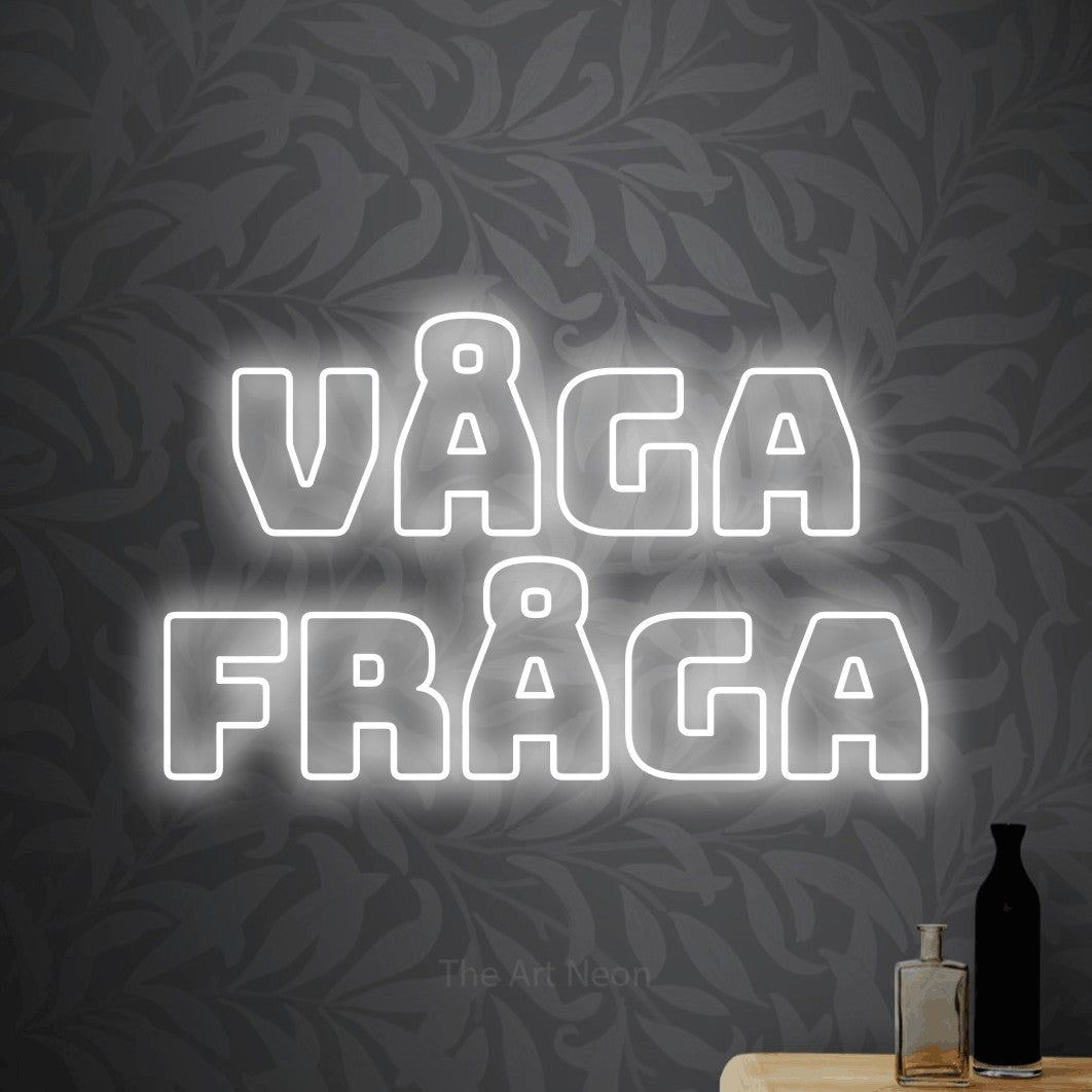 LED neon sign reading “VÅGA FRÅGA”, arranged in 2 lines.