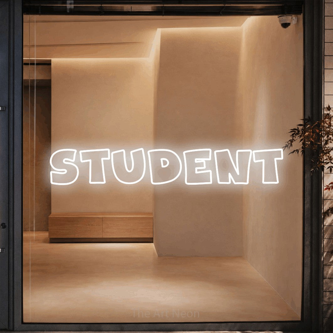 LED neon sign reading “STUDENT”, arranged in a single line.