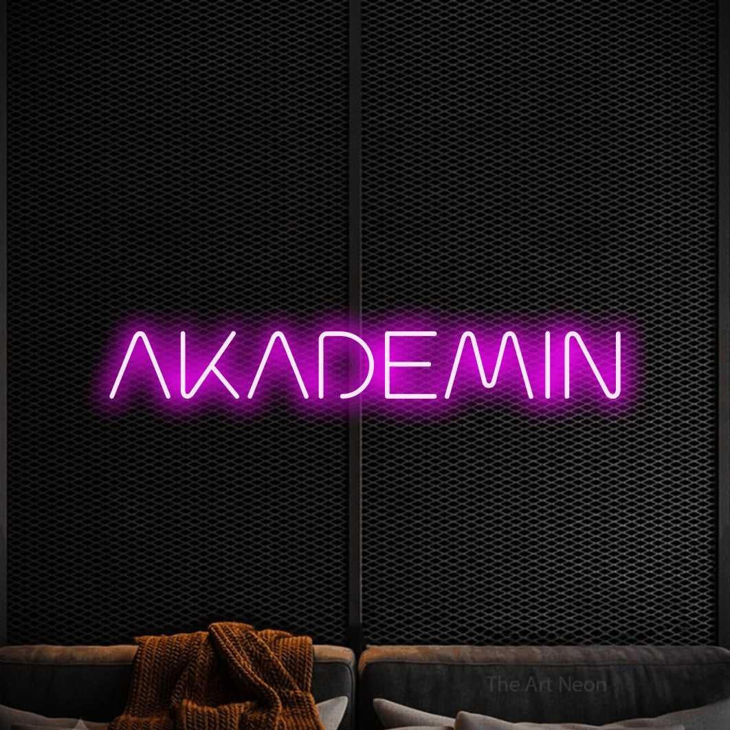 LED neon sign reading “AKADEMIN”, arranged in a single line.