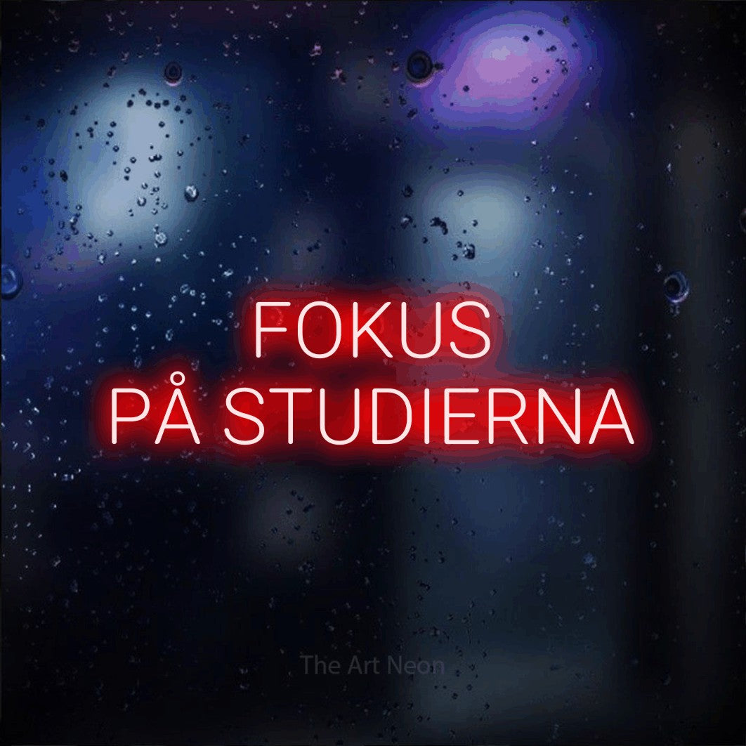 LED neon sign reading “FOKUS PÅ STUDIERNA”, arranged in 2 lines.