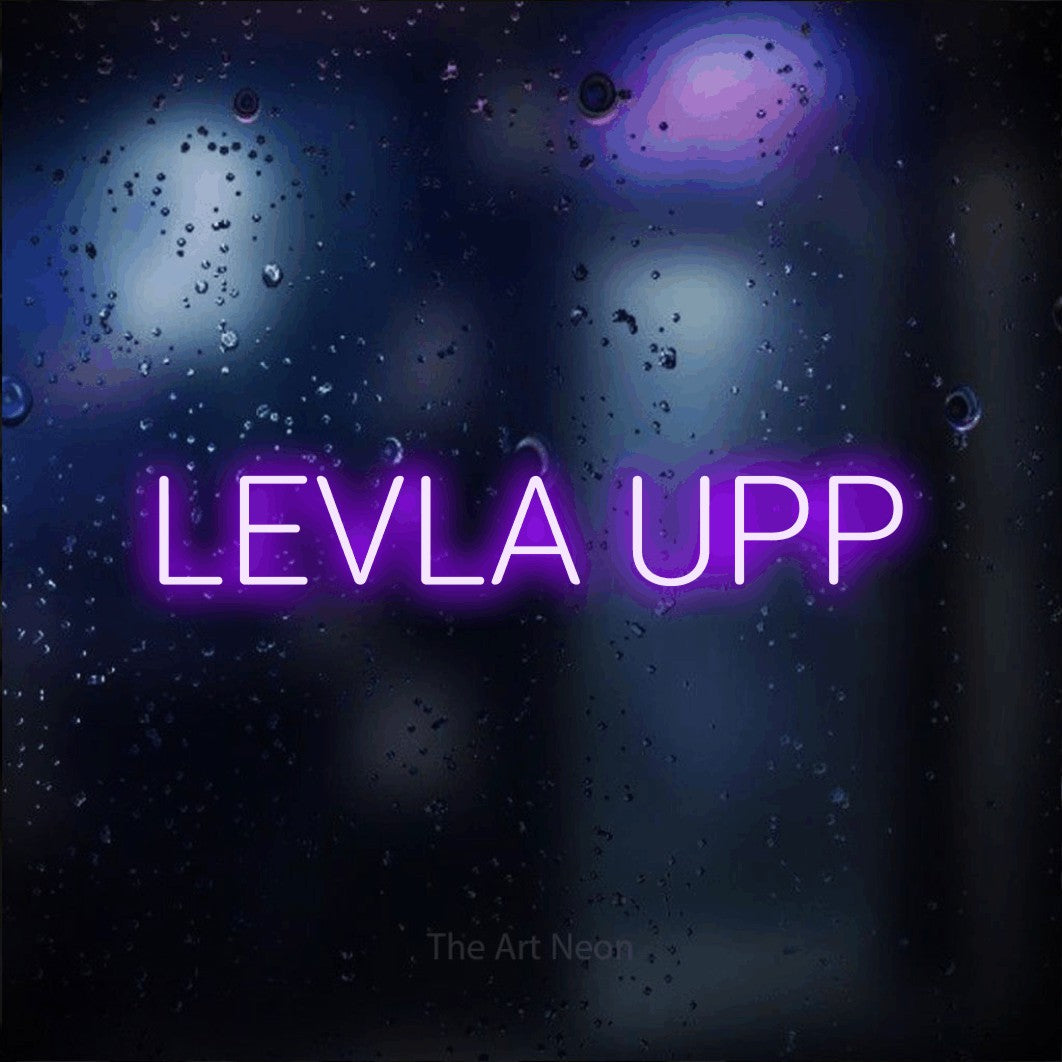 LED neon sign reading “LEVLA UPP”, arranged in a single line.
