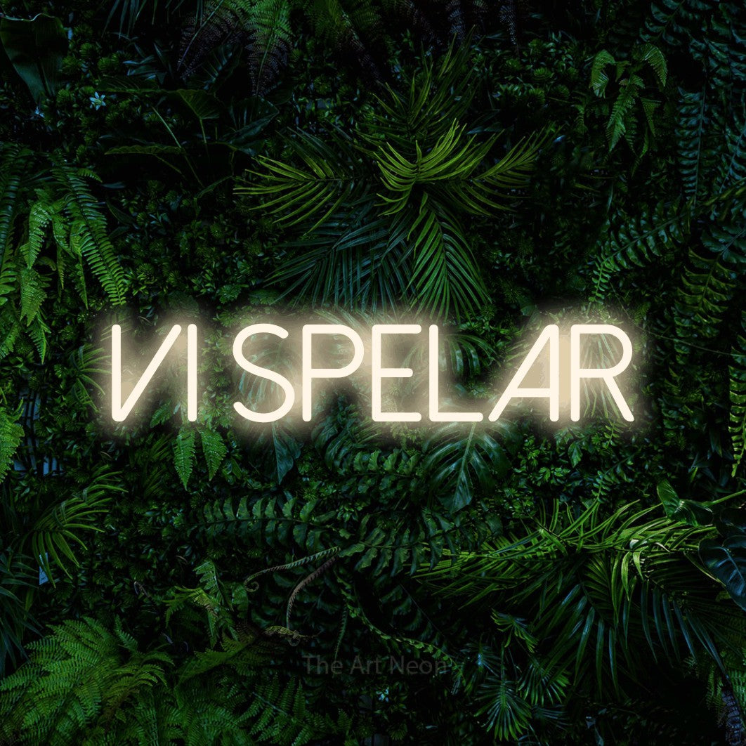 LED neon sign reading “vi SPELAR”, arranged in a single line.