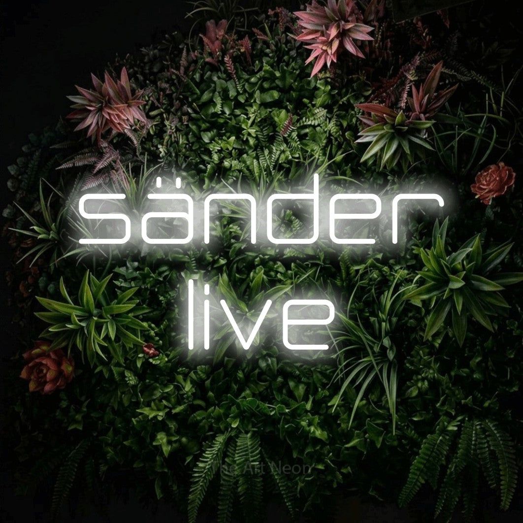 LED neon sign reading “sänder live”, arranged in 2 lines.
