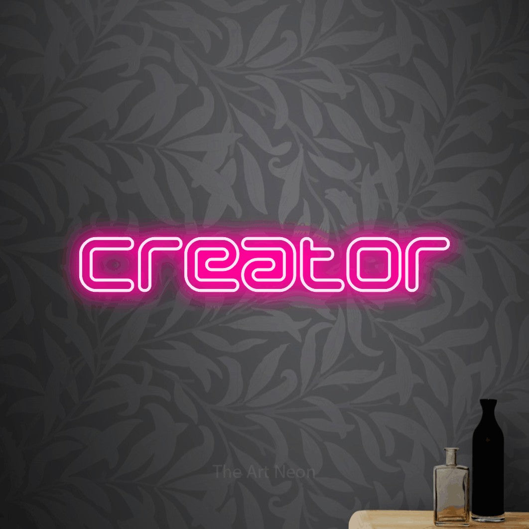 LED neon sign reading “Creator”, arranged in a single line.
