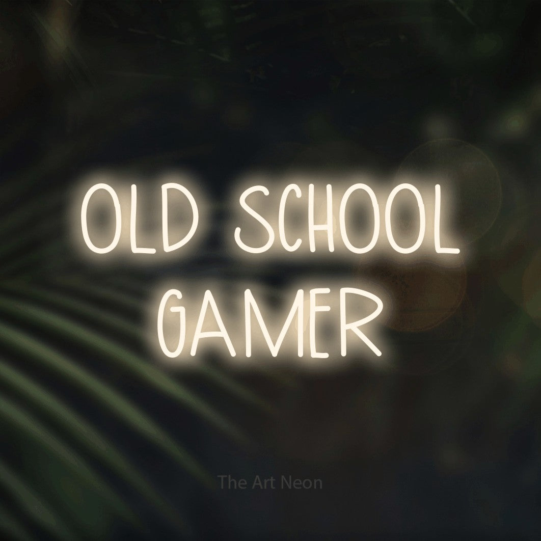 LED neon sign reading “OLD SCHOOL GAMER”, arranged in 2 lines.