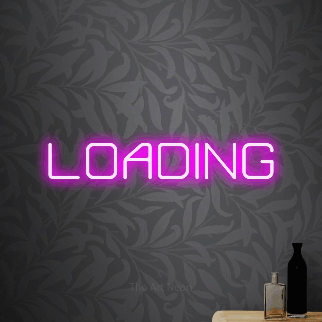 LED neon sign reading “LOADING”, arranged in a single line.