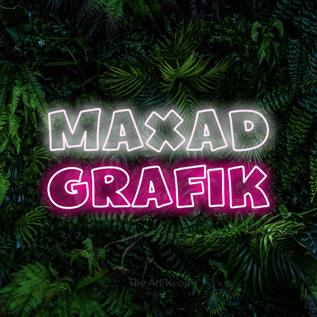 LED neon sign reading “Maxad Grafik”, arranged in 2 lines.