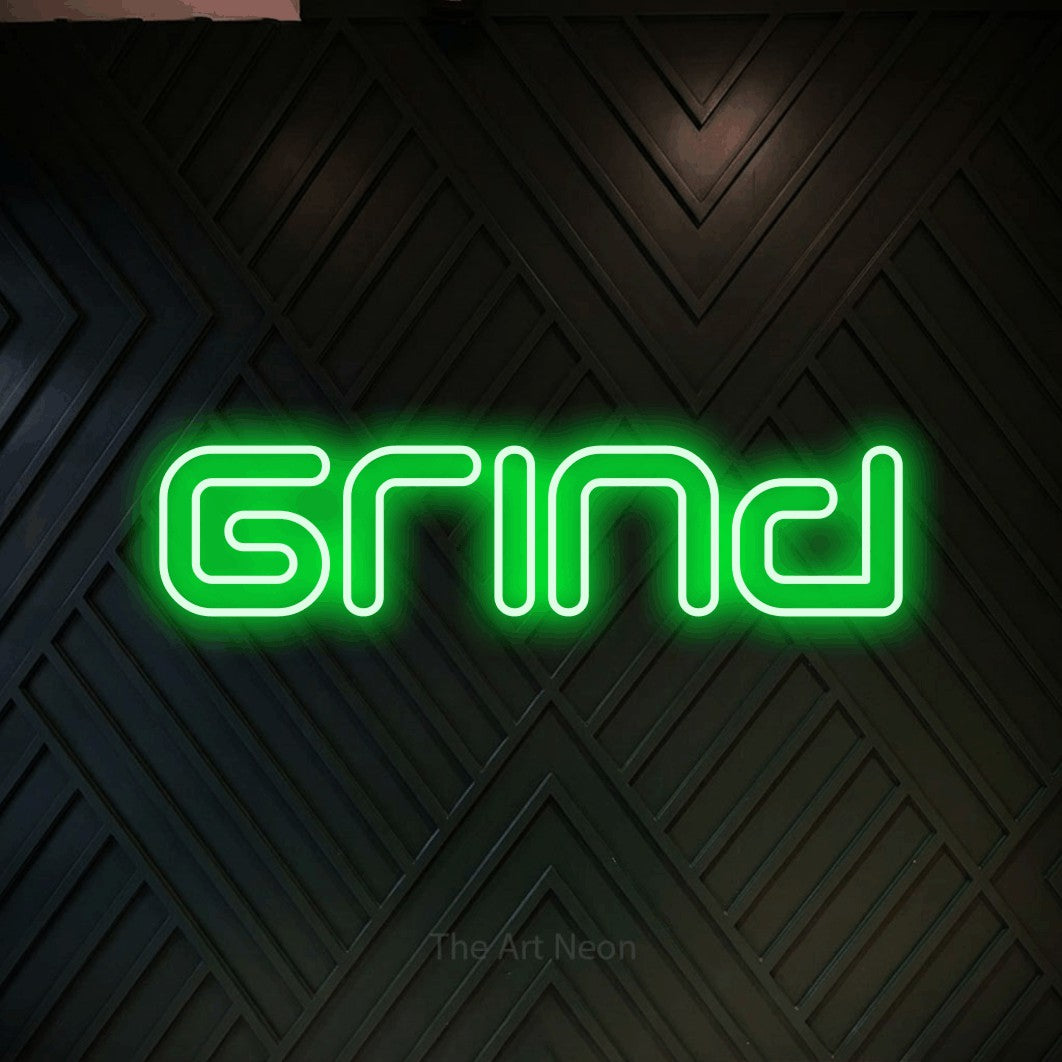 LED neon sign reading “Grind”, arranged in a single line.