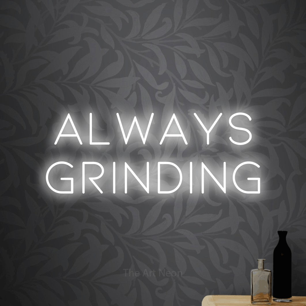 LED neon sign reading “Always grinding”, arranged in 2 lines.